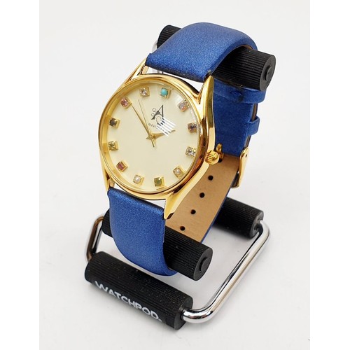 74 - An Anna Bella SPSW001G ladies quartz birthstone wrist watch, working order, UK shipping £14.