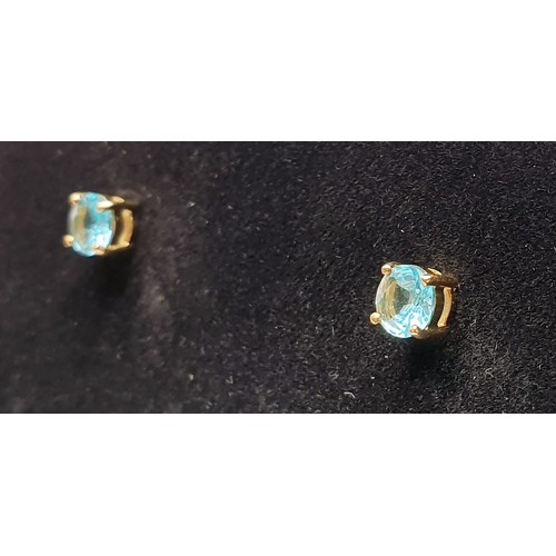 35 - A pair of 9ct gold earrings set with apatite, gross weight 1.3g. UK shipping £14.