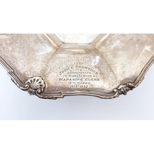 81 - A hallmarked silver dish with in inscription, diameter 10.25