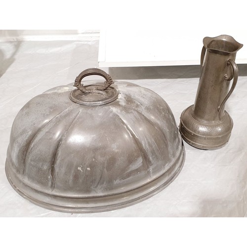 111 - A pewter cloche by James Dixon and Sons, Sheffield, length 16.5