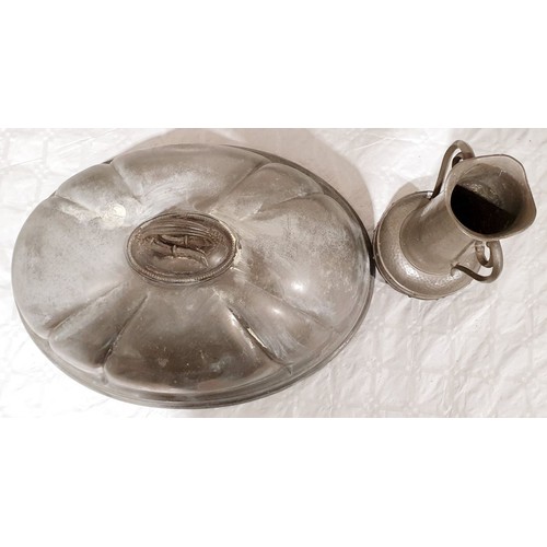 111 - A pewter cloche by James Dixon and Sons, Sheffield, length 16.5