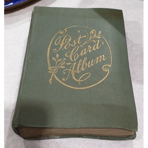 159 - A postcard album. UK shipping £14.