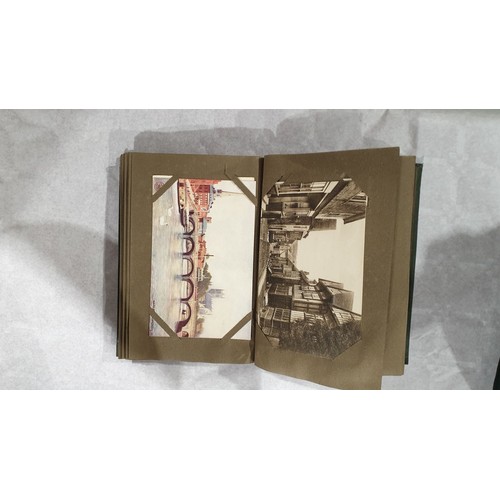 159 - A postcard album. UK shipping £14.