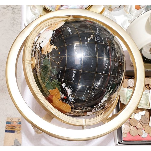 170 - A Gem globe on a brass stand, height 12.5