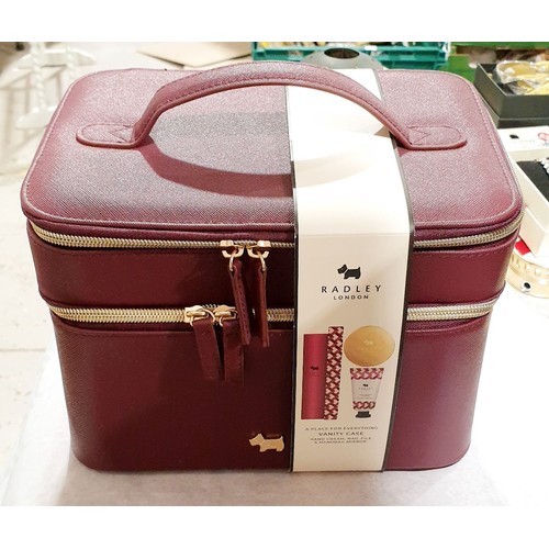 189 - A Radley vanity case and contents. UK shipping £14.