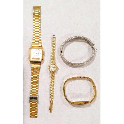 234 - A Casio AQ-230 gentleman's wrist watch, two ladies wrist watches and a bangle. UK shipping £14.