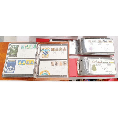 242 - Three albums of first day covers. UK shipping £14.