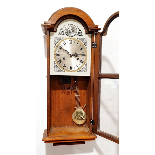 277 - A vintage wall clock, length 28