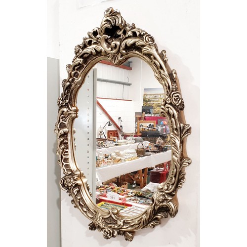 371 - A wall mirror, length 24.25