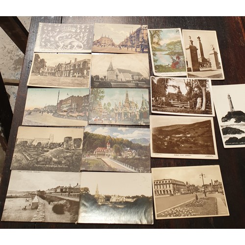 84 - A selection of approx 200 antique and later postcards. UK shipping £14.