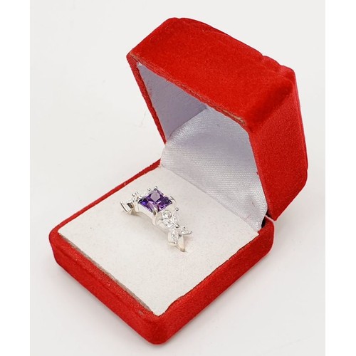 2 - A 925 silver ring set with purple and white stones, size Q. UK shipping £14.