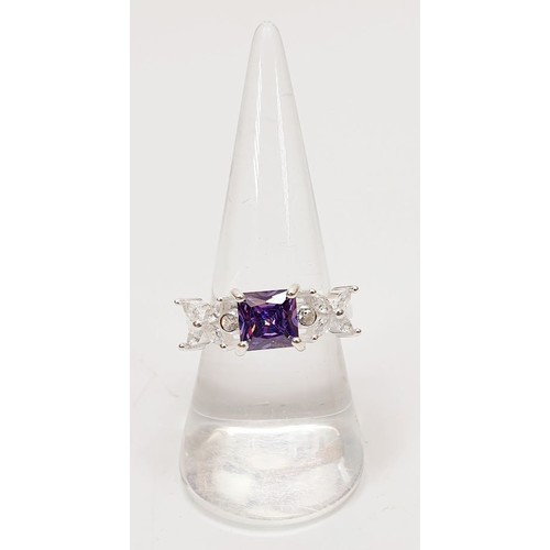 2 - A 925 silver ring set with purple and white stones, size Q. UK shipping £14.