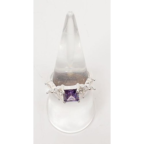 2 - A 925 silver ring set with purple and white stones, size Q. UK shipping £14.