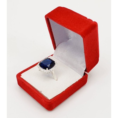 3 - A 925 silver ring set with blue and white stones, size O/P. UK shipping £14.