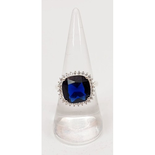 3 - A 925 silver ring set with blue and white stones, size O/P. UK shipping £14.