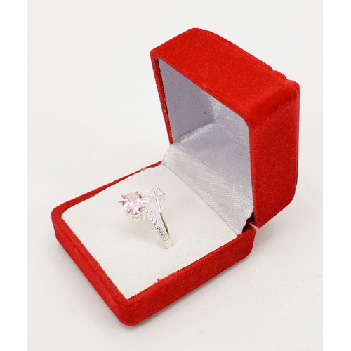 4 - A 925 silver ring set with pink and white stones, size Q/R. UK shipping £14.