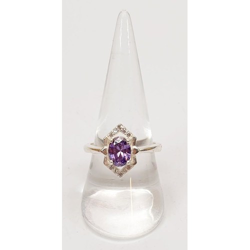 6 - A 925 silver ring set with purple stones, size S. UK shipping £14.