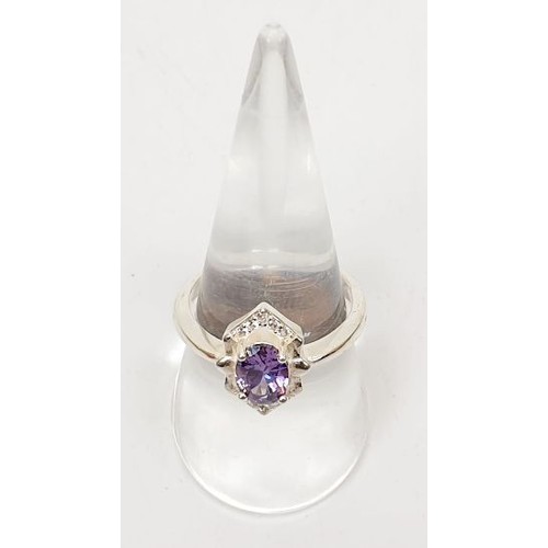 6 - A 925 silver ring set with purple stones, size S. UK shipping £14.