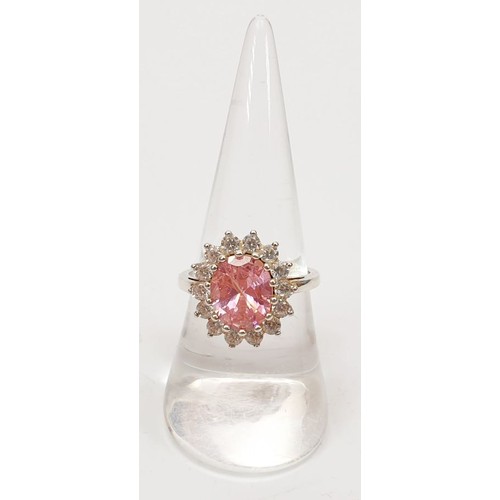 7 - A 925 silver ring set with pink and white stones, size O. UK shipping £14.