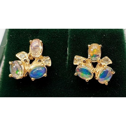 11 - A pair of hallmarked 9ct gold earrings set with jelly opals, gross weight 2.5g. UK shipping £14.