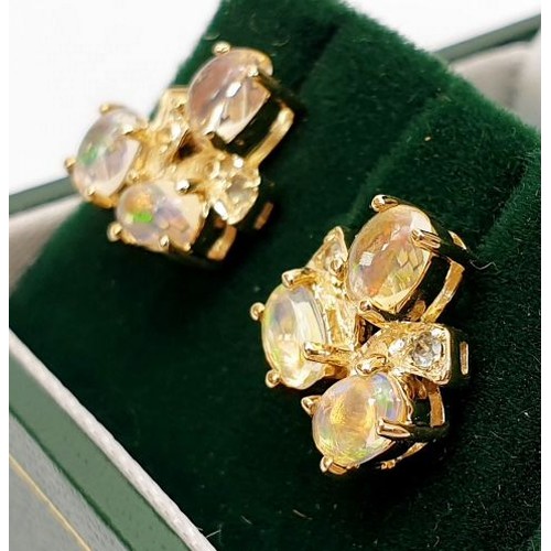 11 - A pair of hallmarked 9ct gold earrings set with jelly opals, gross weight 2.5g. UK shipping £14.