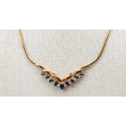 19 - A hallmarked 9ct gold necklace set with diamonds and sapphires, weight 9g. UK shipping £14.