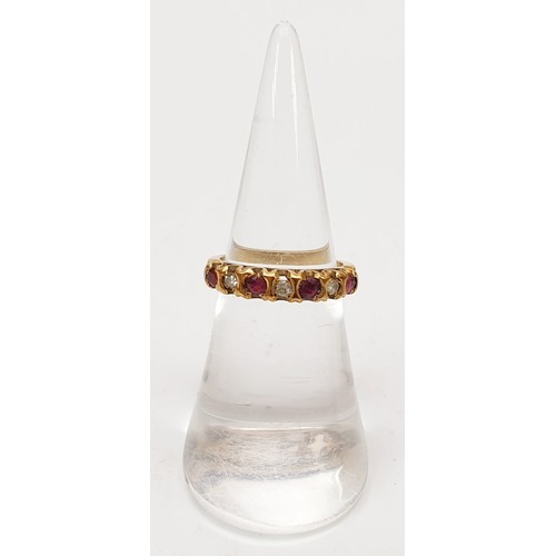 20 - A hallmarked 9ct gold ring set with rubies and diamonds, size J, gross weight 2g. UK shipping £14.