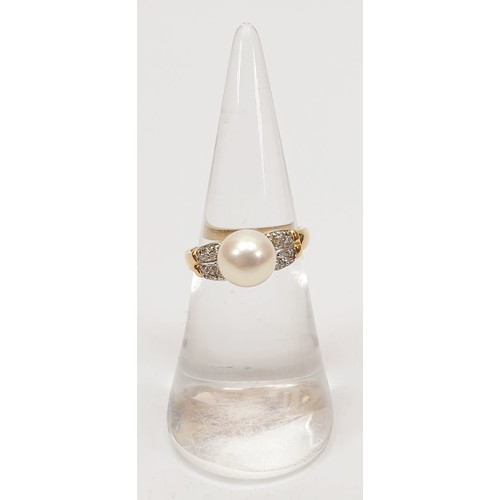 22 - A 14ct gold pearl ring set with white stones, size J, gross weight 2.7g. UK shipping £14.