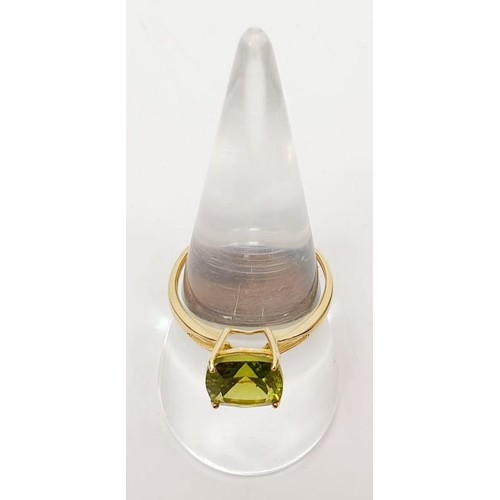 30 - A hallmarked 9ct gold peridot solitaire ring, size Q, gross weight 1.8g. UK shipping £14.