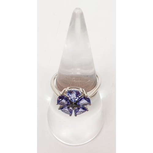 32 - A hallmarked 9ct AA tanzanite cluster ring, size O, gross weight 2.2g. UK shipping £14.