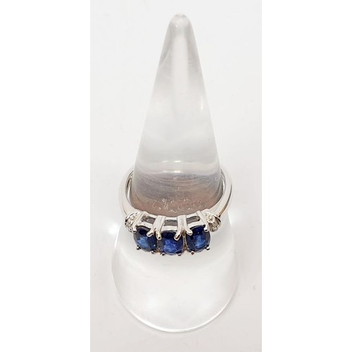 33 - A hallmarked 9ct white gold ring set with Ceylon sapphire and diamonds, size N/O, gross weight 3g. U... 