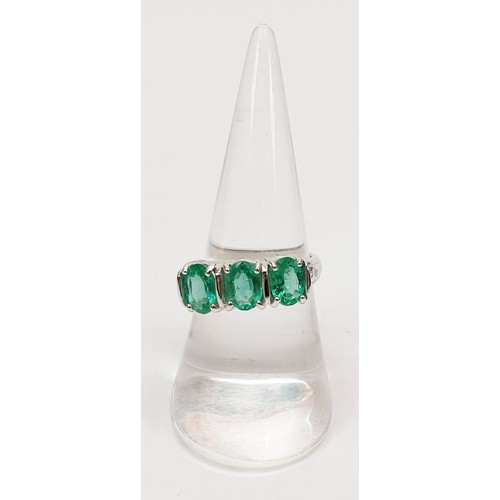 37 - A hallmarked 9ct white gold ring set with emerald and diamond, size N/O, gross weight 4.2g. UK shipp... 