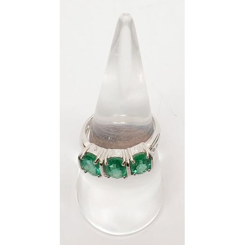 37 - A hallmarked 9ct white gold ring set with emerald and diamond, size N/O, gross weight 4.2g. UK shipp... 