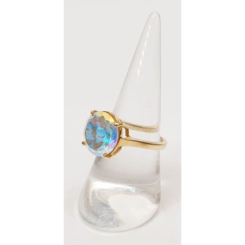 38 - A hallmarked 9ct gold ring set with mystic topaz, size N/O, gross weight 4g. UK shipping £14.