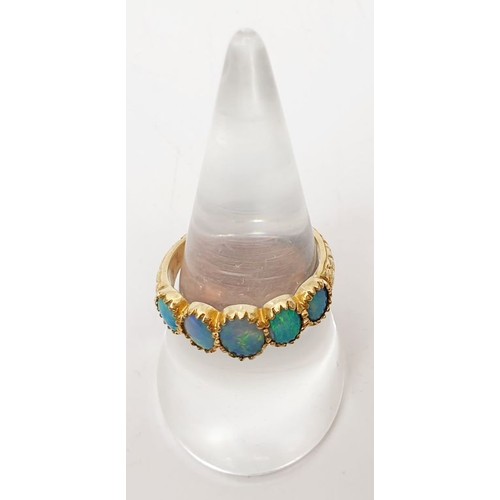 41 - A hallmarked 9ct gold ring set with faux opal, size O, gross weight 2.9g. UK shipping £14.