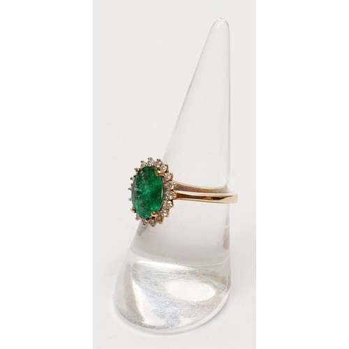 44 - A hallmarked 9ct emerald and diamond cluster ring, size O/P, gross weight 2.7g. UK shipping £14.