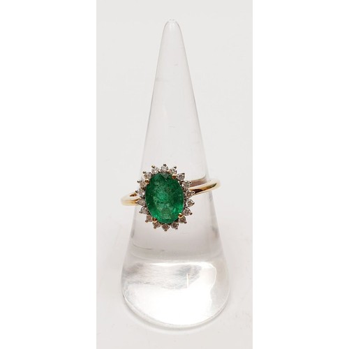 44 - A hallmarked 9ct emerald and diamond cluster ring, size O/P, gross weight 2.7g. UK shipping £14.