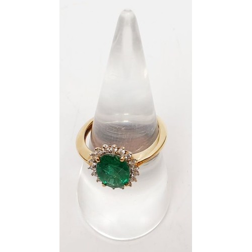 44 - A hallmarked 9ct emerald and diamond cluster ring, size O/P, gross weight 2.7g. UK shipping £14.