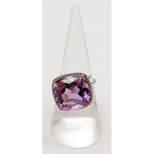 47 - A hallmarked 9ct white gold ring set with ametrine, size O, gross weight 4.6g. UK shipping £14.