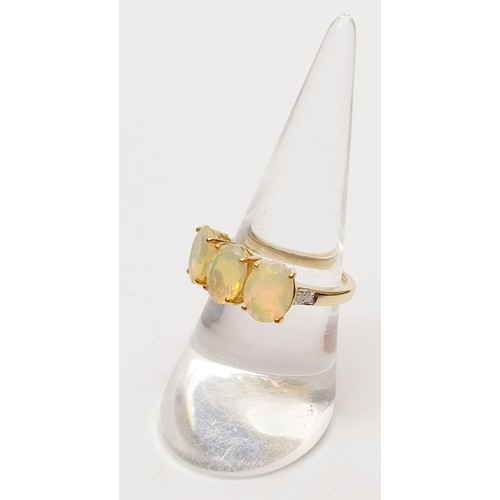 51 - A hallmarked 9ct gold opal and diamond ring, size N/O, gross weight 2.6g. UK shipping £14.