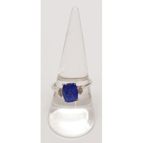 52 - A hallmarked 9ct gold ring set with tanzanite and white zircon, size Q, gross weight 2.8g. UK shippi... 