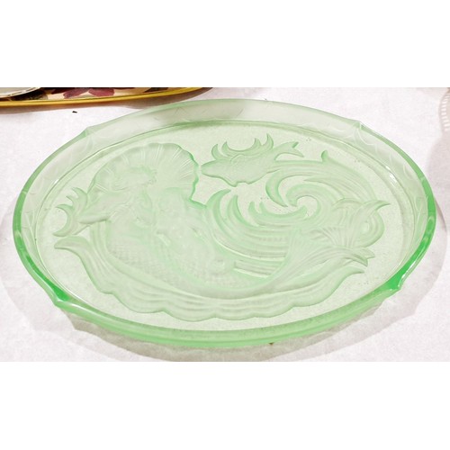 69 - A 1920s uranium glass dressing table tray with an intaglio scene of a merman and mermaid. No shippin... 