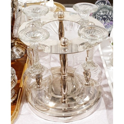 78 - A silver plated wine bottle and glass stand, height 7.75