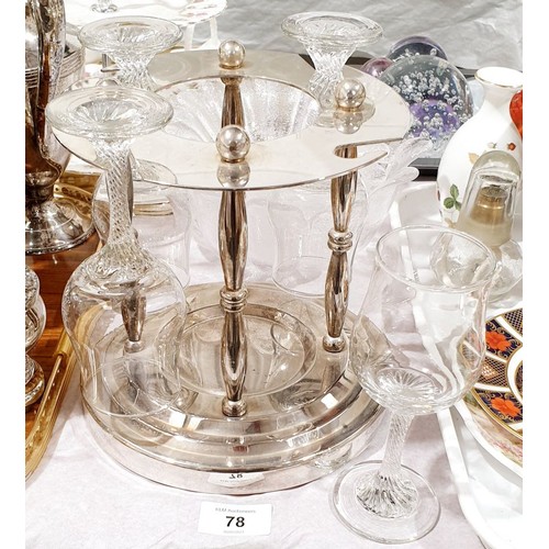 78 - A silver plated wine bottle and glass stand, height 7.75