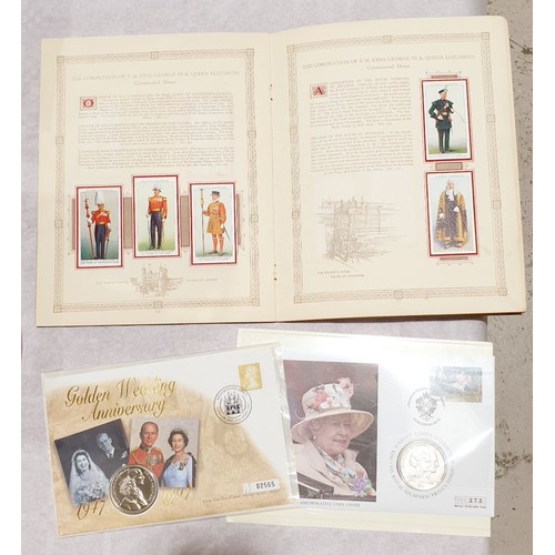 125 - Two coin covers and a 1937 John Player Coronation cigarette card book. UK shipping £14.