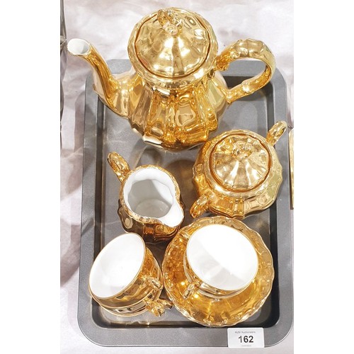 162 - A Dareuther lustre tea service. No shipping. Arrange collection or your own packer and shipper, plea... 