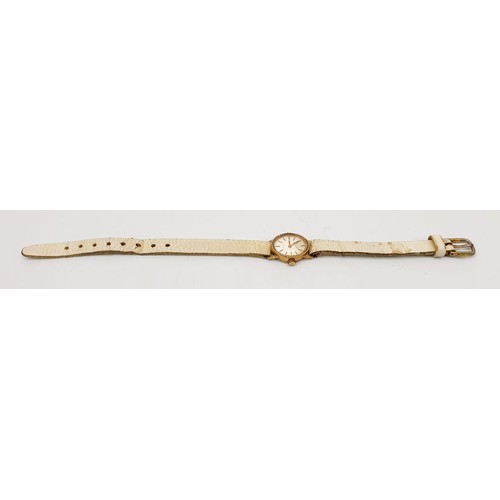 2 - A 9ct gold cased ladies wrist watch. UK shipping £14.