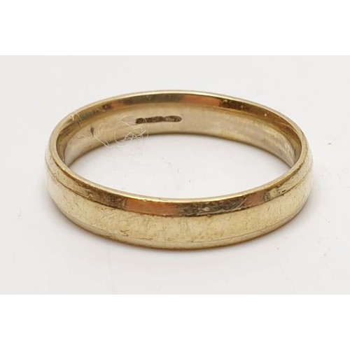 18 - A hallmarked 9ct gold wedding band, size P/Q, weight 3.9g. UK shipping £14.