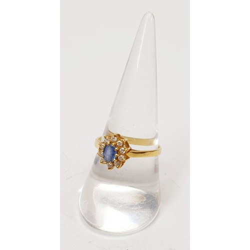 22 - A hallmarked 18ct gold sapphire and diamond cluster ring, size Q, gross weight 2.4g. UK shipping £14... 