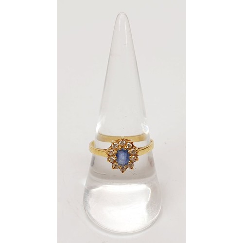 22 - A hallmarked 18ct gold sapphire and diamond cluster ring, size Q, gross weight 2.4g. UK shipping £14... 